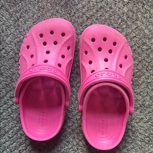 CROCS Pink Sandals with Perforated Design and Rotating Heel Strap